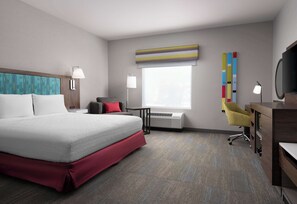 Ropa de cama hipoalergénica y caja de seguridad en la habitación 