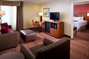 Suite, One King Bed, Non-Smoking | Hypo-allergenic bedding, desk, blackout curtains, iron/ironing board