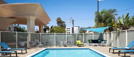 Outdoor pool, open 8:00 AM to 10:00 PM, pool umbrellas, sun loungers