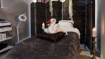 Sauna, tina de hidromasaje, tratamientos corporales y aromaterapia