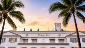 A hotel with a classic facade, arched windows, and a sign reading 'The Betsy Ross'. - The Betsy - South Beach (Miami Beach)