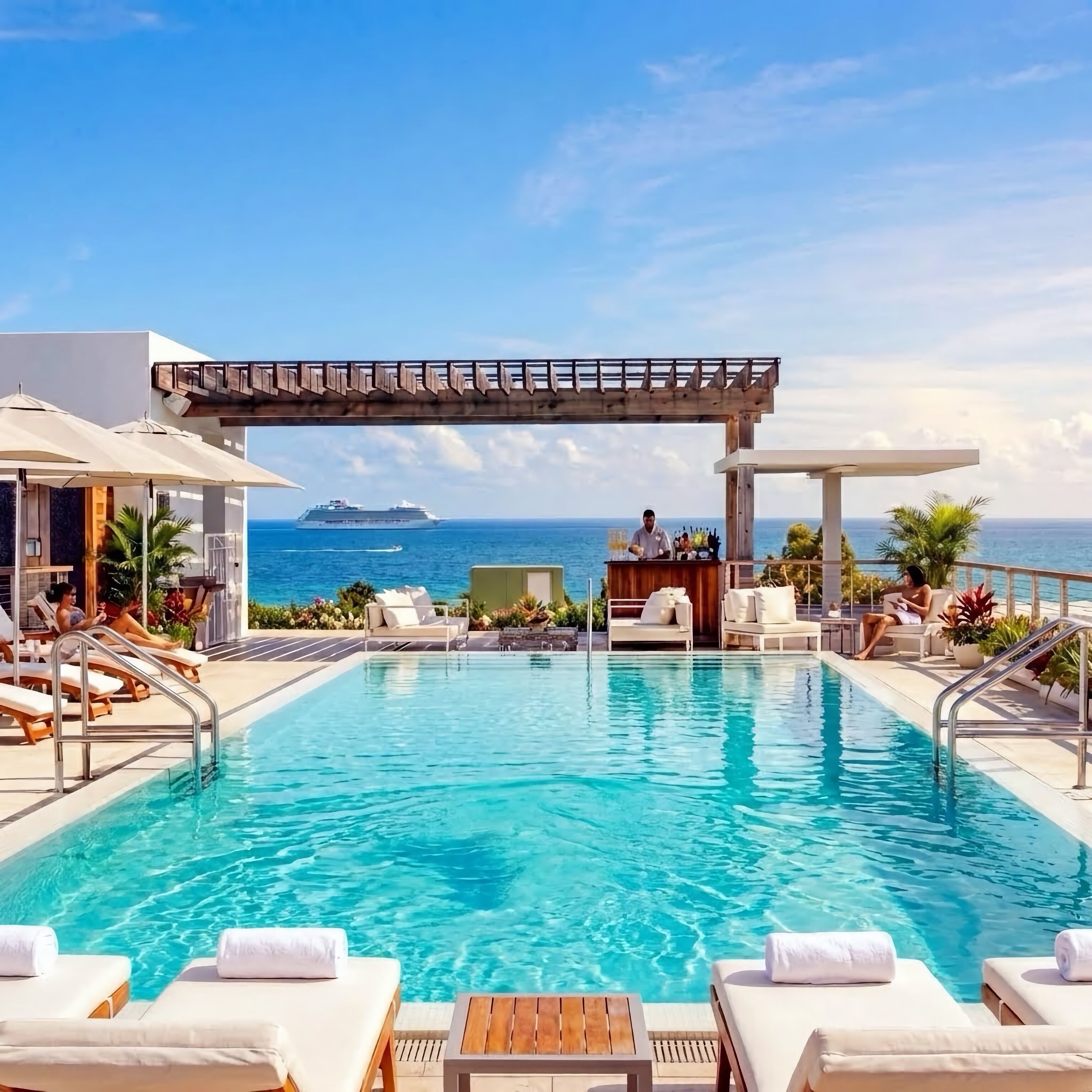 2 outdoor pools, pool umbrellas, pool loungers