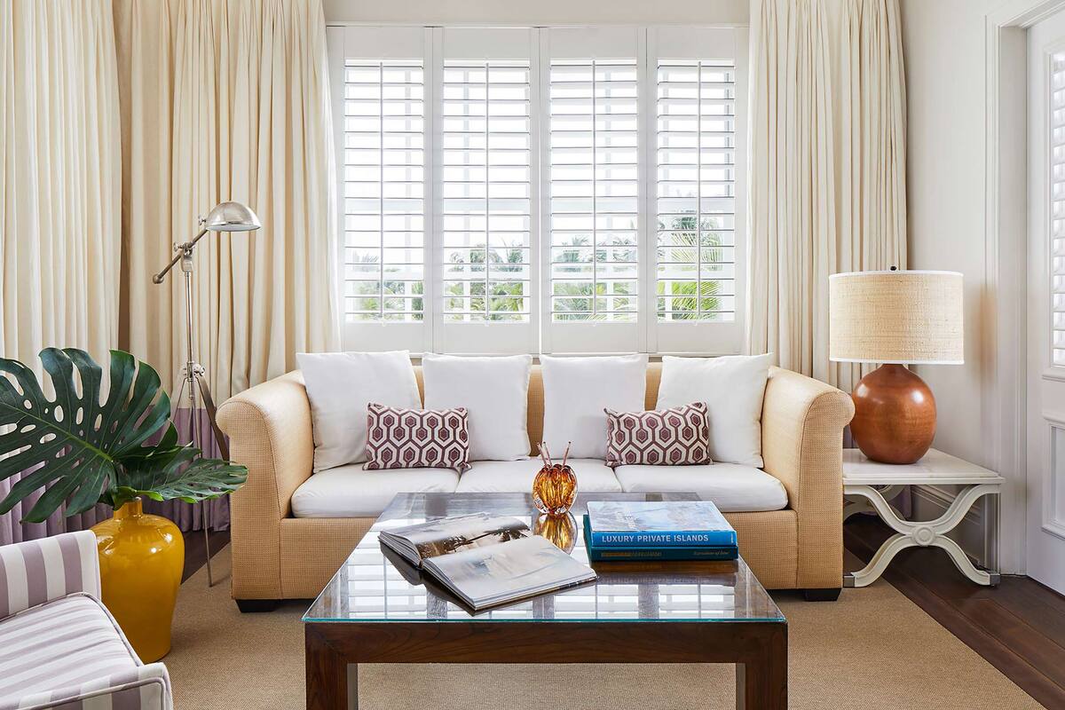 royal ocean view suite | living area | 50-inch lcd tv with satellite channels, tv, pay films