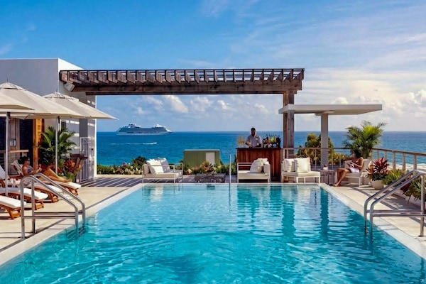 2 outdoor pools, pool umbrellas, sun loungers