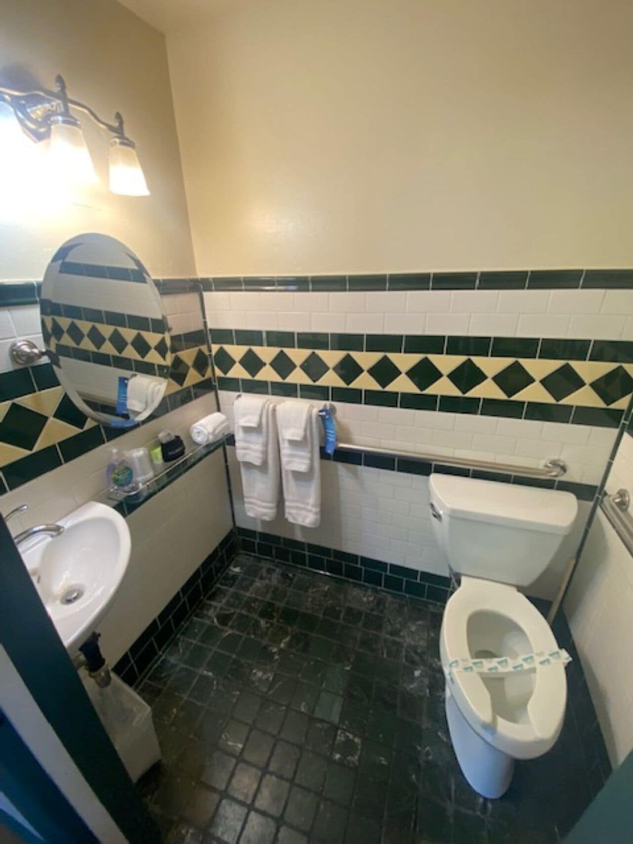 standard room, 1 queen bed (room 11) | bathroom | free toiletries, hair dryer, towels