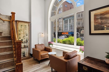 Sitting area in hotel lobby at The Andrews Hotel
