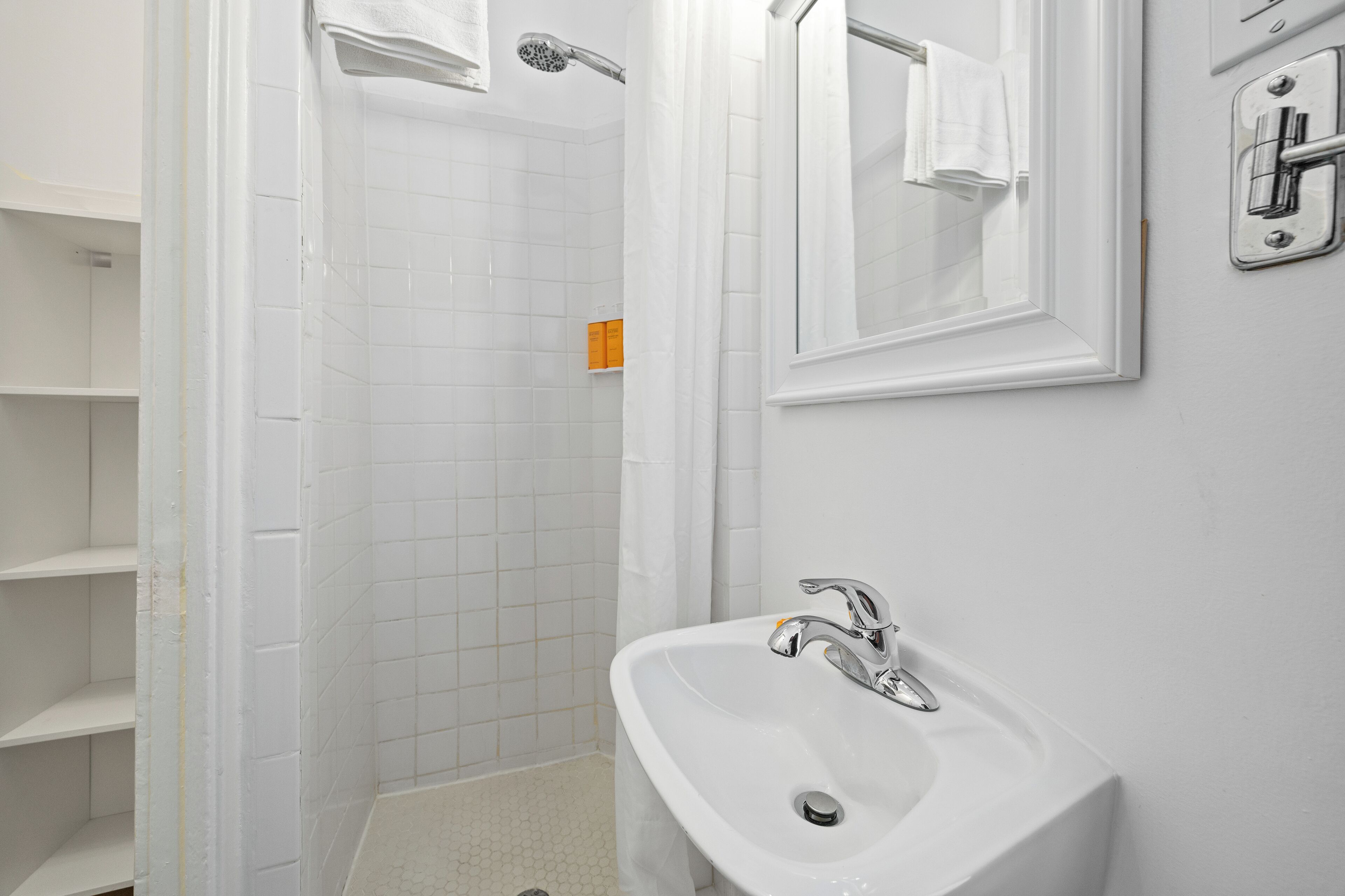 room, 1 king bed (sunny bay) | bathroom | eco-friendly toiletries, hair dryer, towels