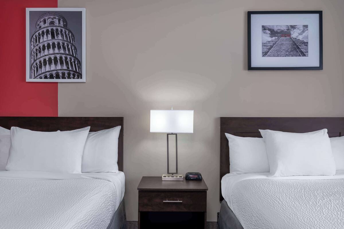 Room, Multiple Beds, Non Smoking | In-room safe, desk, laptop workspace, blackout curtains