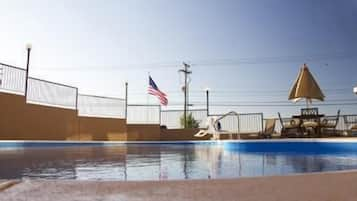 Seasonal outdoor pool, pool umbrellas, sun loungers