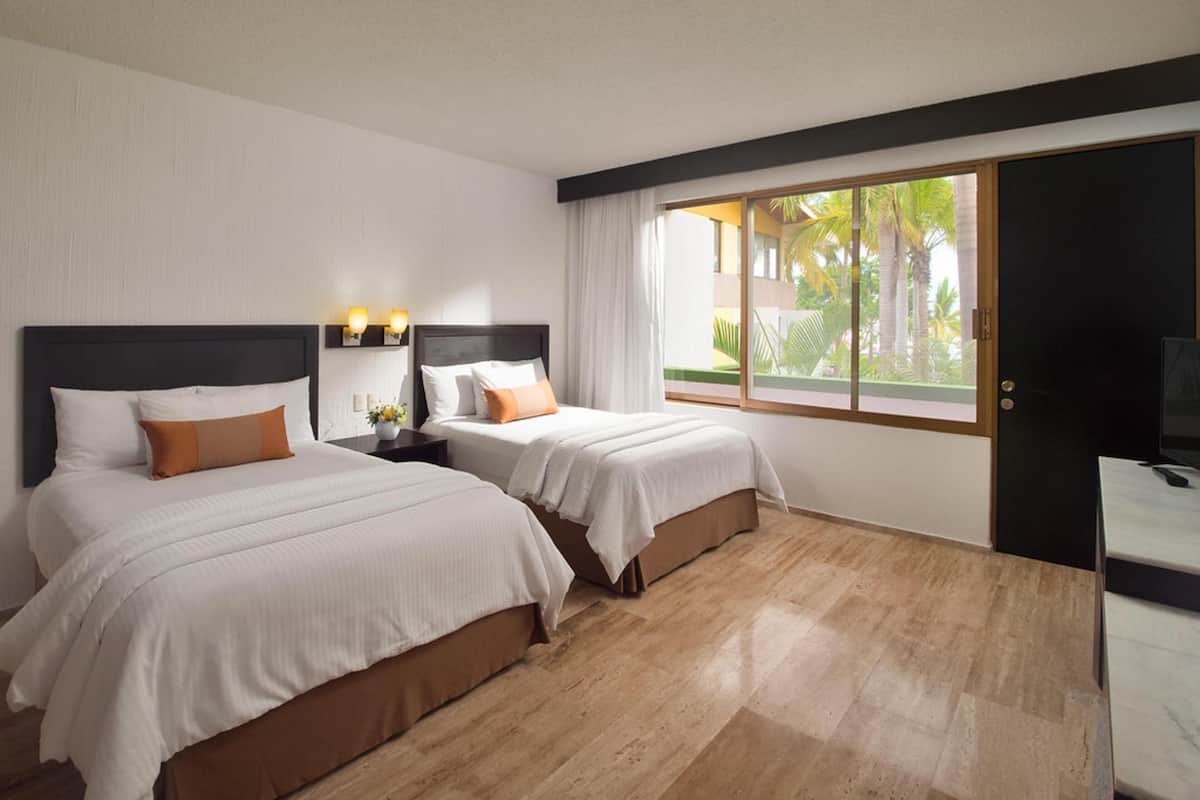 In-room safe, iron/ironing board (on request), bed sheets