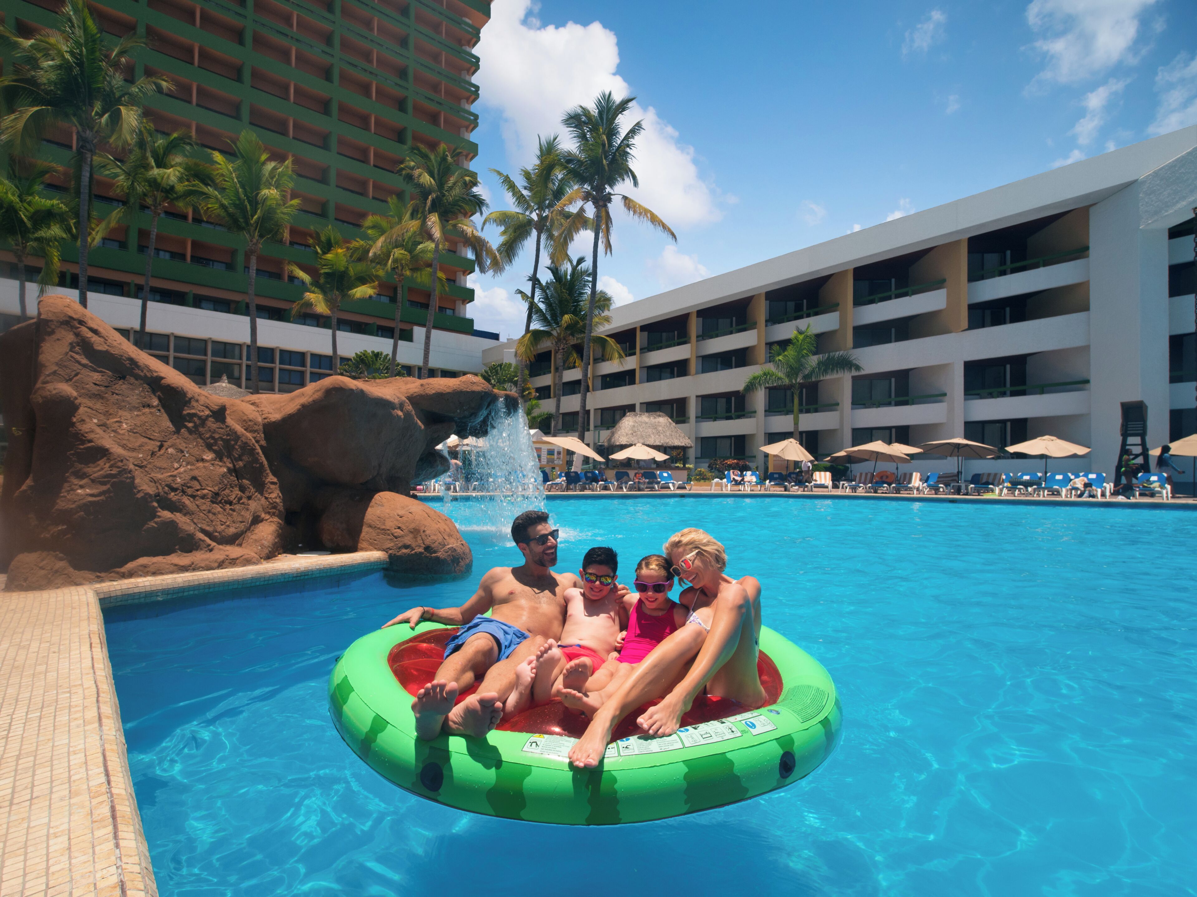 Outdoor pool, free cabanas, pool umbrellas