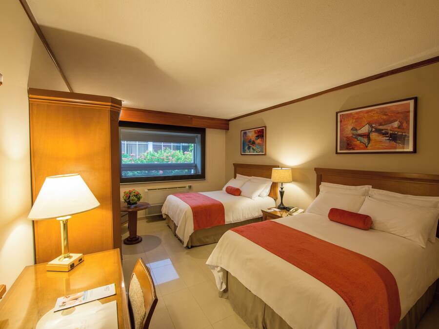 Double Room with 2 Double Beds | Egyptian cotton sheets, in-room safe, desk, blackout drapes
