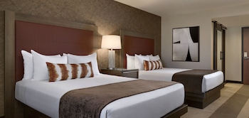 Pillowtop beds, in-room safe, desk, laptop workspace at Santa Fe Station Hotel & Casino