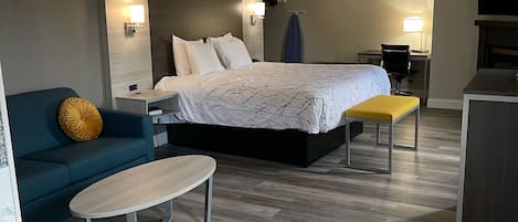 Premier Suite, 1 King Bed with Sofa bed, Whirl pool, Fireplace, Non Smoking | 1 bedroom, desk, blackout curtains, iron/ironing board