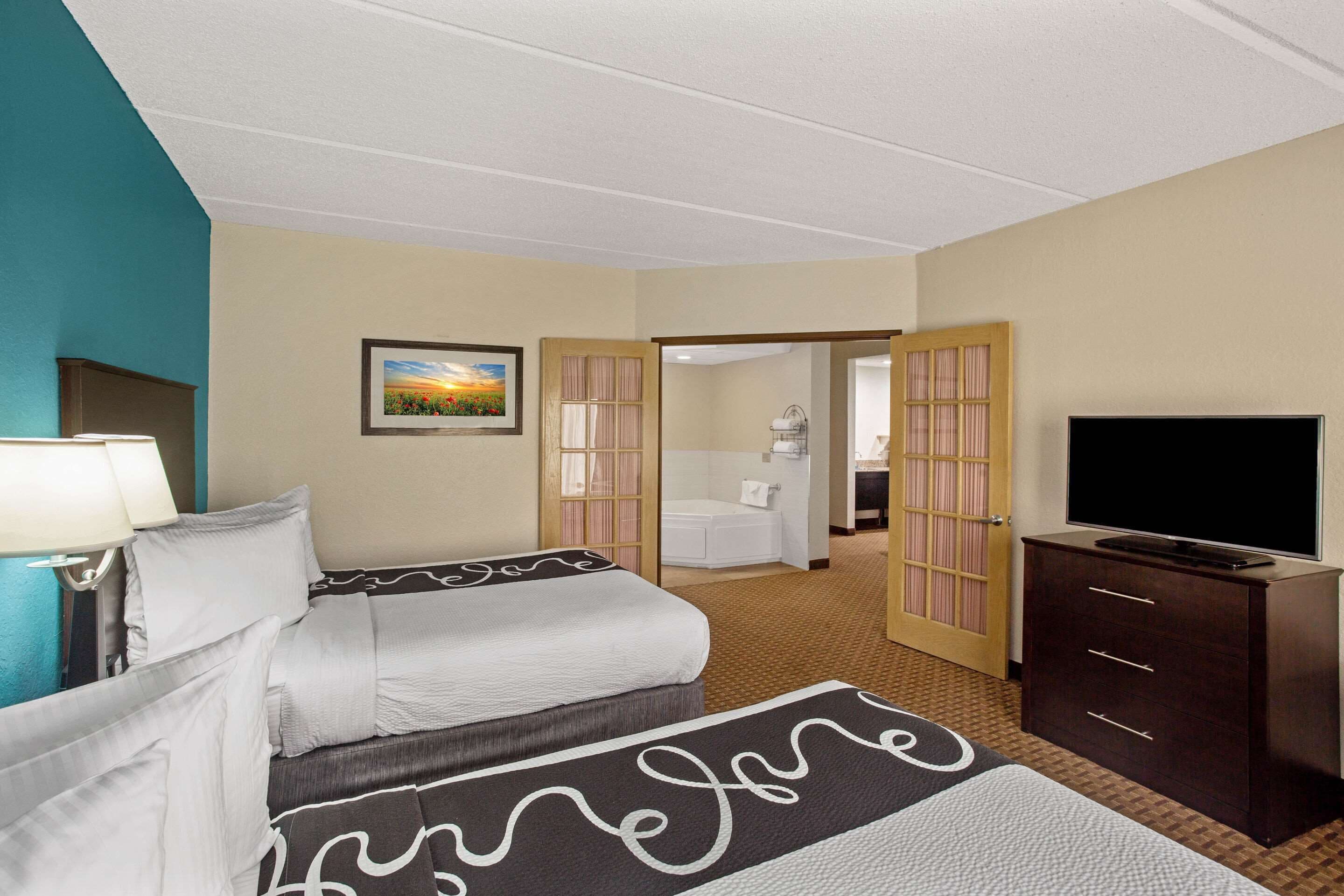 suite, multiple beds, accessible, non smoking (jetted tub) | premium bedding, desk, laptop workspace, blackout curtains
