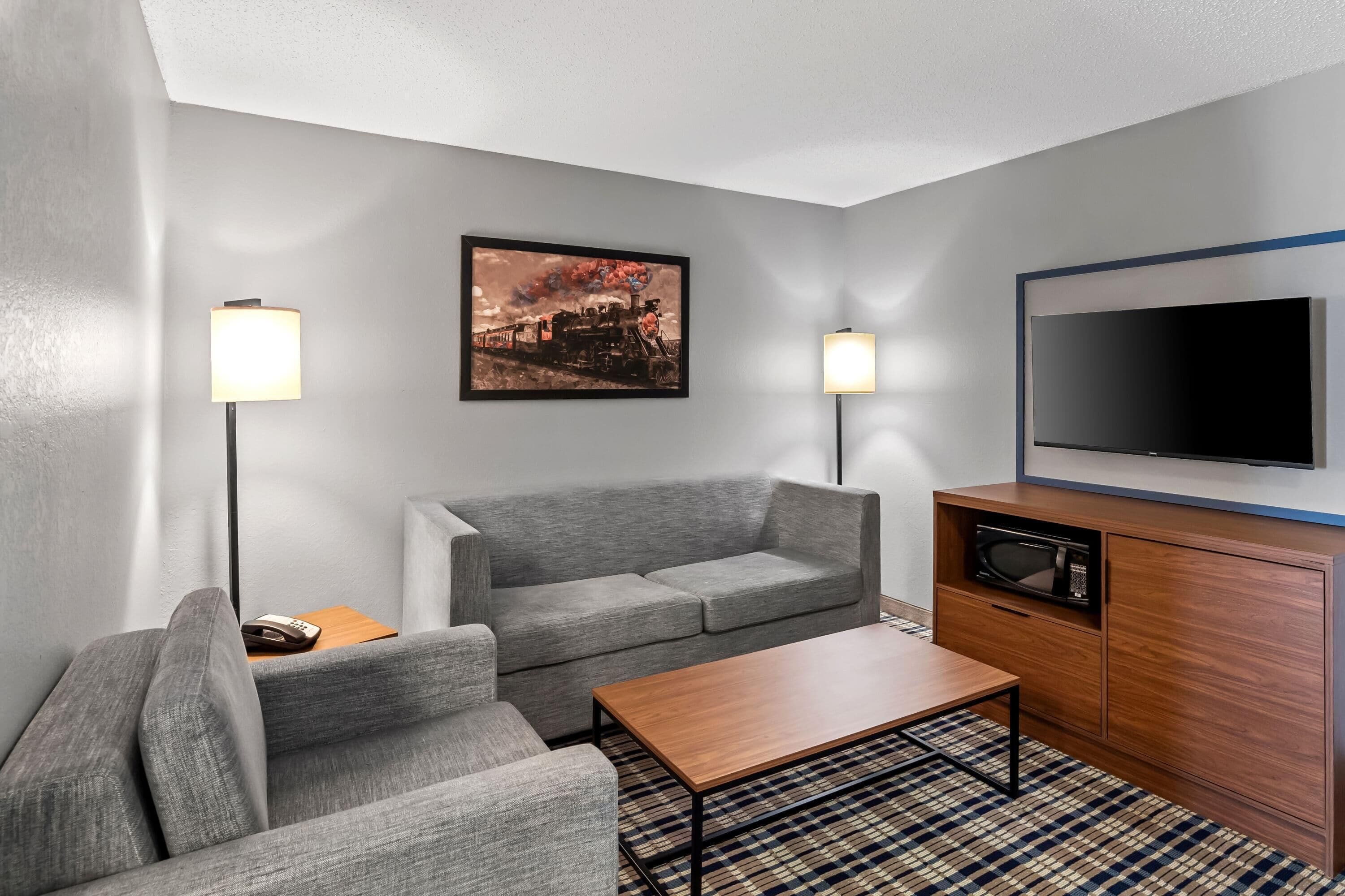 desk, blackout curtains, iron/ironing board, free cots/infant beds