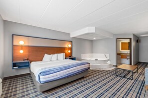 Deluxe Studio Suite, 1 King Bed, Non Smoking | Desk, blackout drapes, iron/ironing board, free cribs/infant beds
