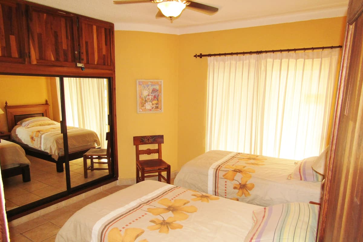 Blackout curtains, iron/ironing board, free cots/infant beds