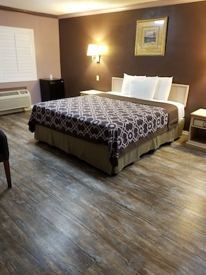 Chambre Standard, 1 très grand lit | 1 chambre, fer et planche à repasser, Wi-Fi gratuit, draps fournis