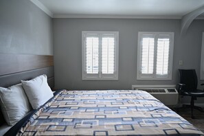Standard Room, 1 King Bed | 1 bedroom, iron/ironing board, free WiFi, bed sheets