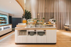 Daily buffet breakfast (AUD 38 per person)