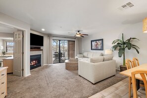 1 Bdrm Lakefront Jacuzzi w/ Fireplace | Living area | TV, DVD player - Still Waters Resort (Branson)