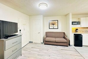 Room, 1 Queen Bed with Sofa bed, Non Smoking (Efficiency) | Iron/ironing board, free WiFi, bed sheets
