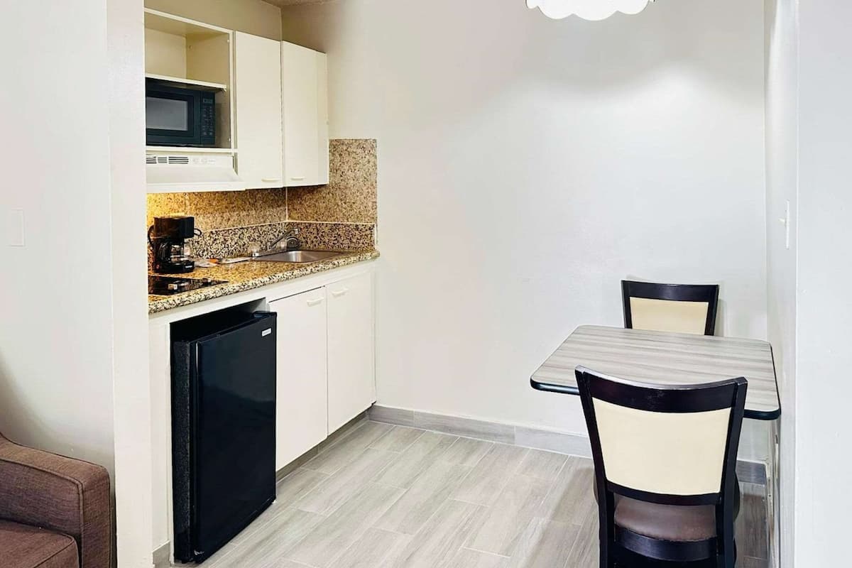 Room, 1 Queen Bed with Sofa bed, Accessible, Smoking (Efficiency) | Iron/ironing board, free WiFi, bed sheets