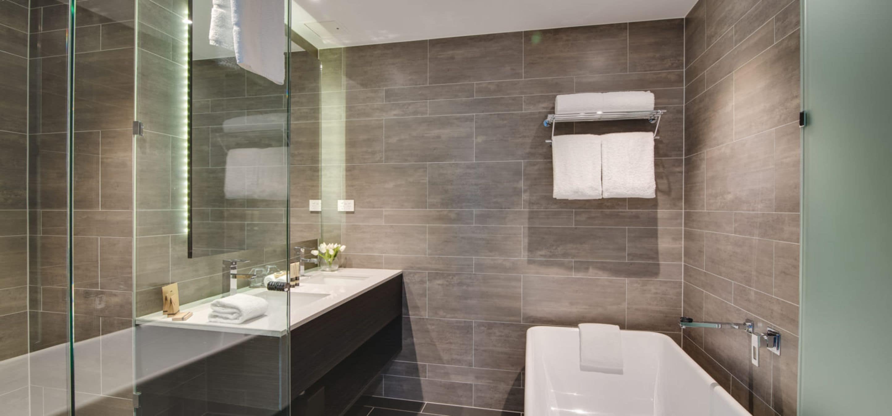 altitude suite | bathroom | shower, free toiletries, hair dryer, towels