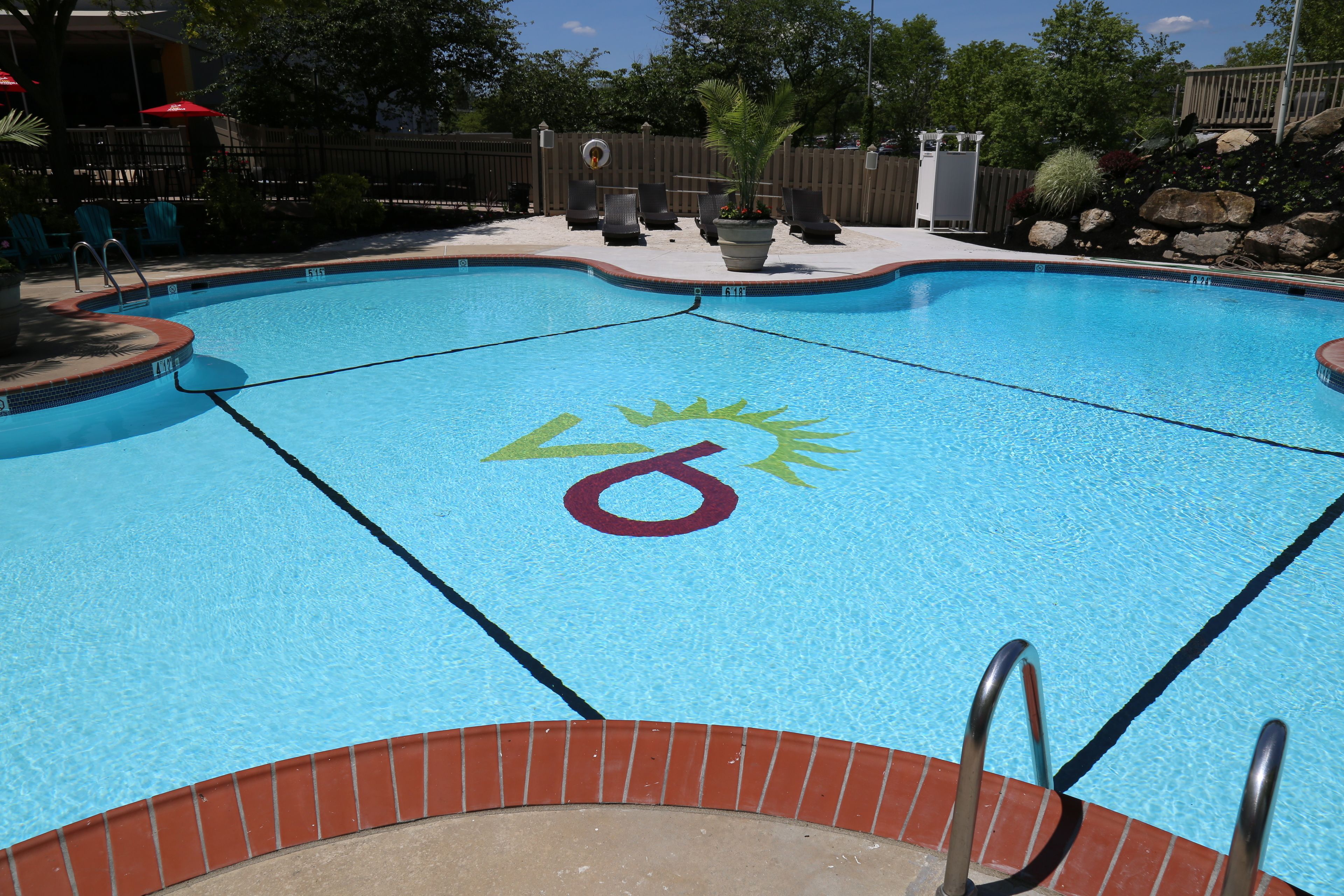 outdoor pool, pool umbrellas, pool loungers