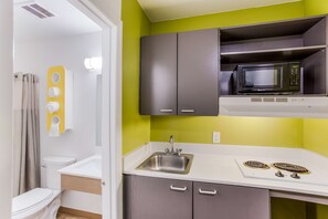 Fridge, microwave, stovetop, coffee/tea maker