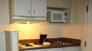 Fridge, microwave, stovetop, coffee/tea maker