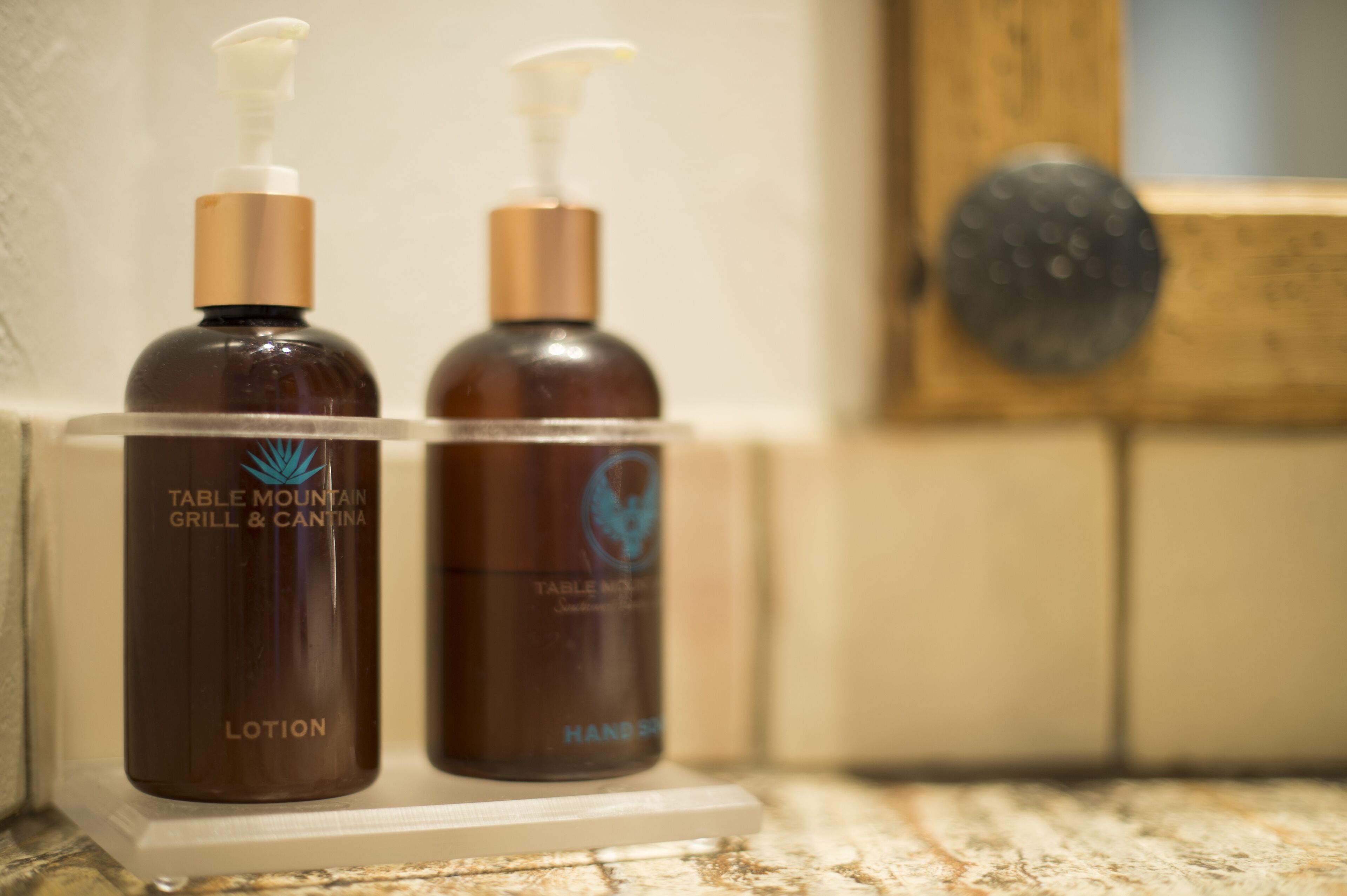 designer toiletries, hair dryer, towels, soap