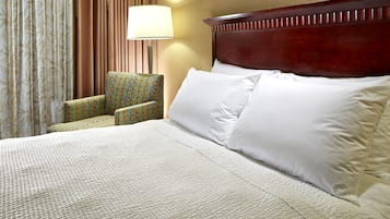 Hypo-allergenic bedding, desk, laptop workspace, blackout curtains