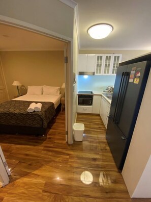 Deluxe Apartment, 1 Bedroom, Non Smoking | 1 bedroom, in-room safe, individually decorated, individually furnished