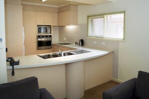 Standard One Bedroom Apartment | Private kitchen