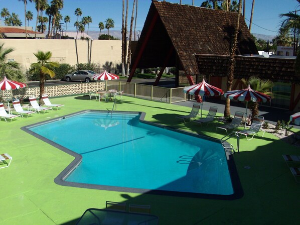 Outdoor pool, pool umbrellas, sun loungers