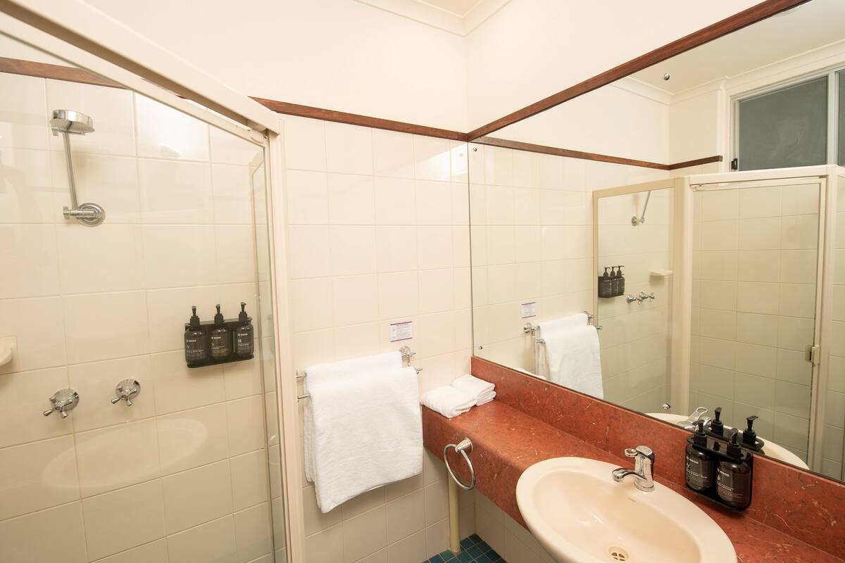 shower, eco-friendly toiletries, hair dryer, towels