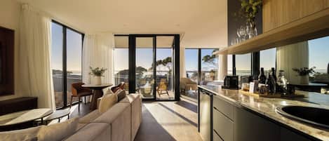 Deluxe Villa, 1 King Bed | Living area | Flat-screen TV