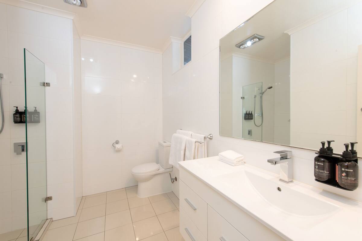 shower, eco-friendly toiletries, hair dryer, towels