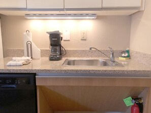 Full-sized fridge, microwave, stovetop, dishwasher