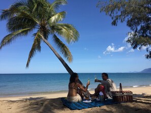 Private beach, white sand, sun loungers, beach towels