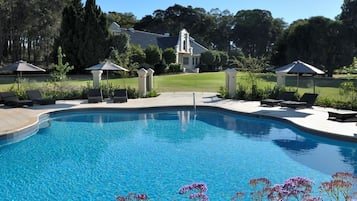 Outdoor pool, pool umbrellas, sun loungers