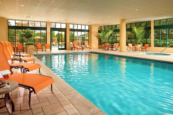 Indoor pool, outdoor pool, pool umbrellas, pool loungers