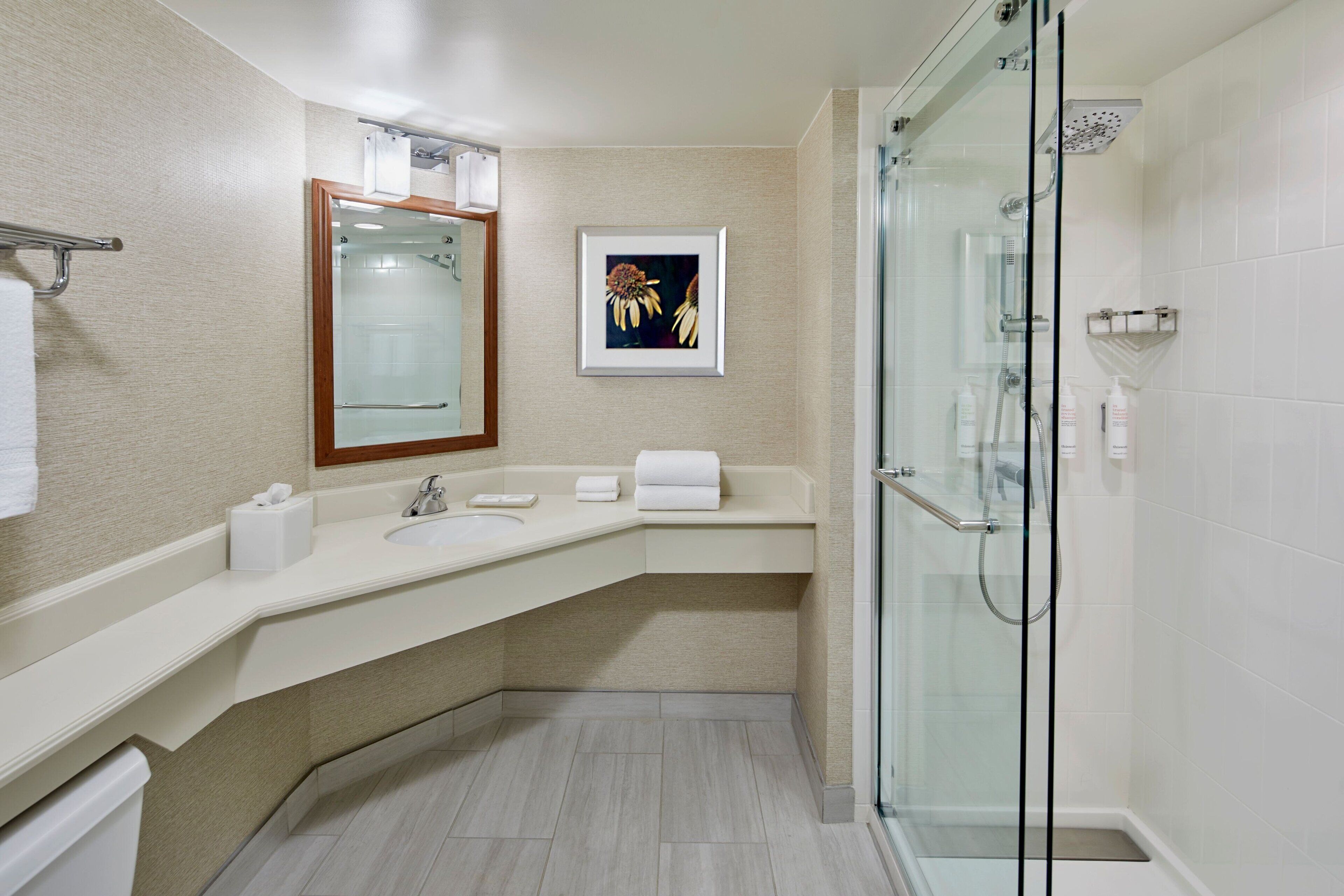 combined shower/bathtub, free toiletries, hair dryer, towels