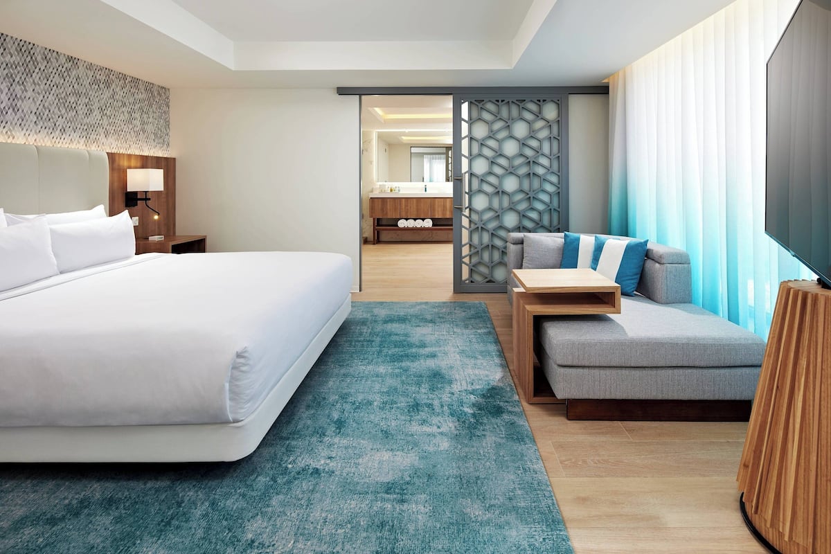 Suíte, 1 quarto, para não fumantes, de frente para o oceano | Roupas de cama premium, camas com colchões pillow-top