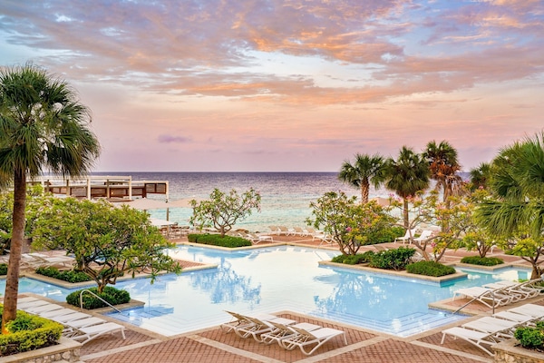 2 outdoor pools, pool umbrellas, pool loungers