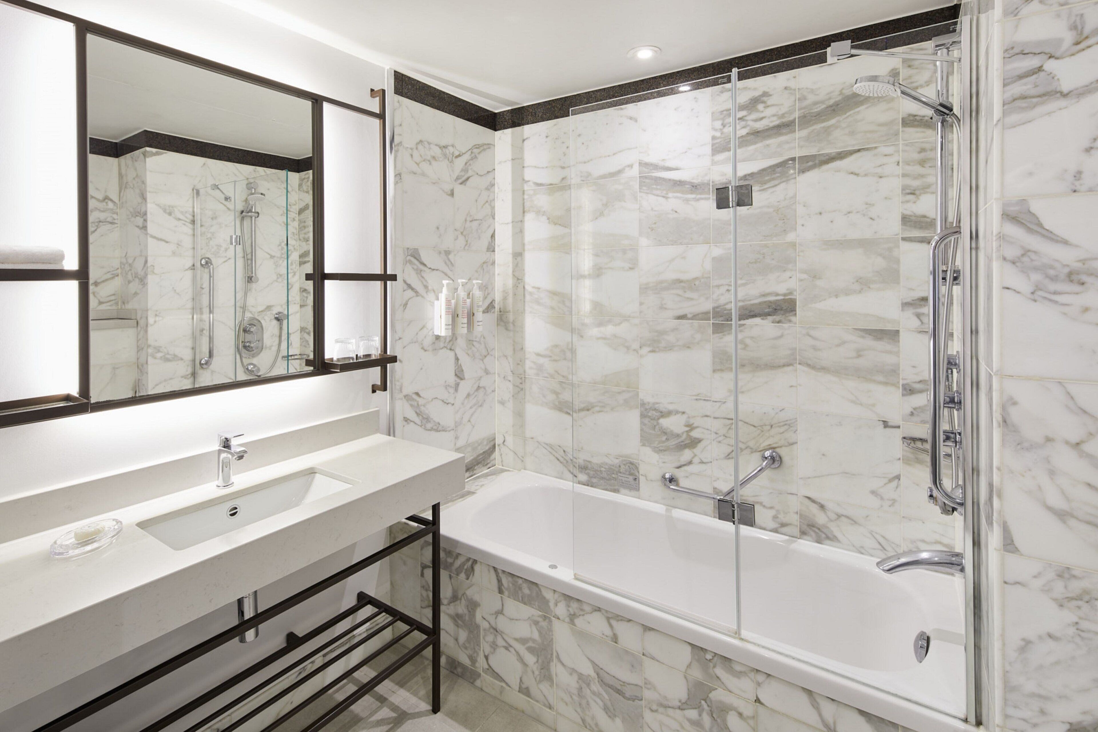 combined shower/bathtub, eco-friendly toiletries, hair dryer, bathrobes