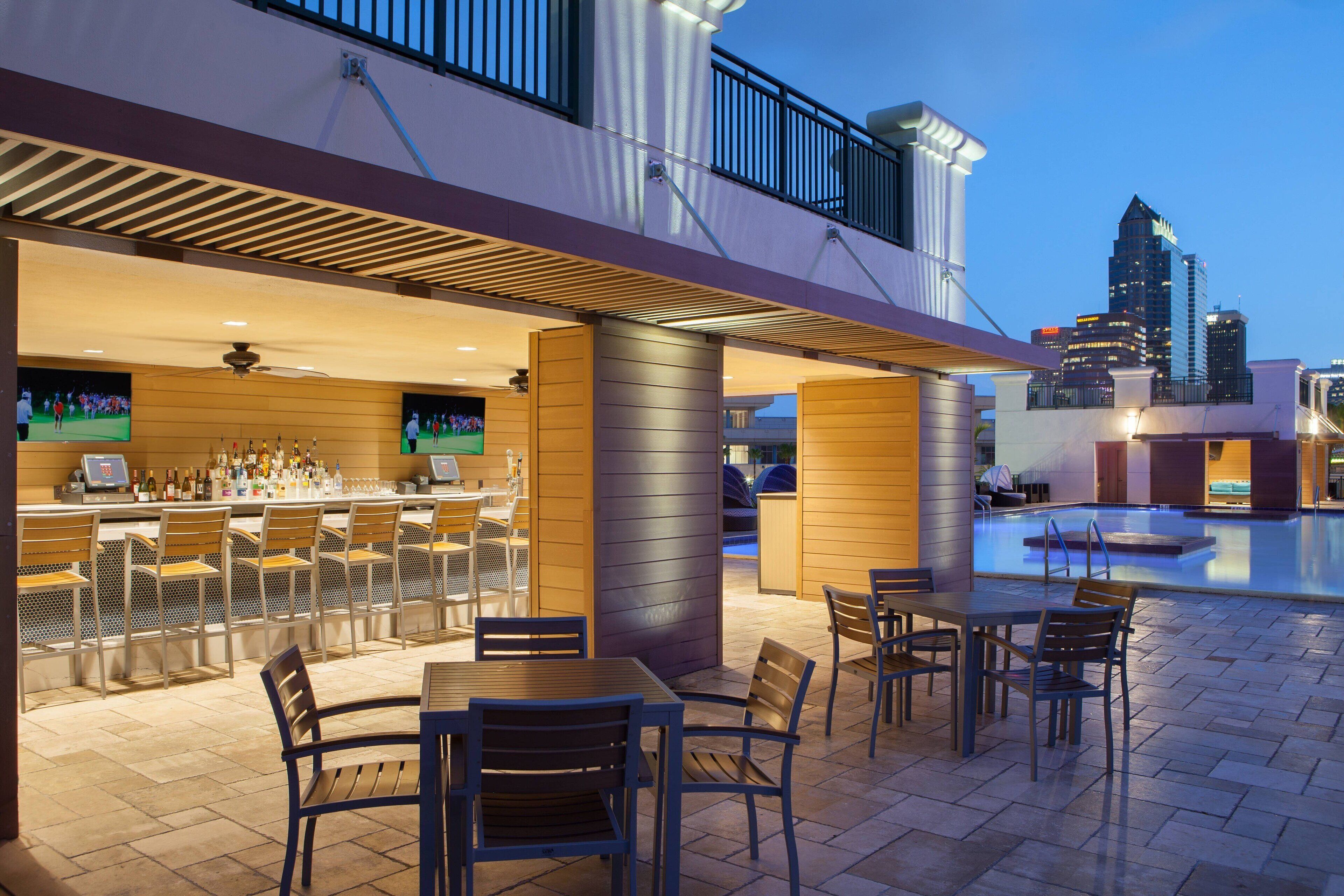 Outdoor pool, open 6:00 AM to 10:00 PM, pool cabanas (surcharge)