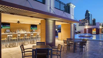 Outdoor pool, open 6:00 AM to 10:00 PM, pool cabanas (surcharge)